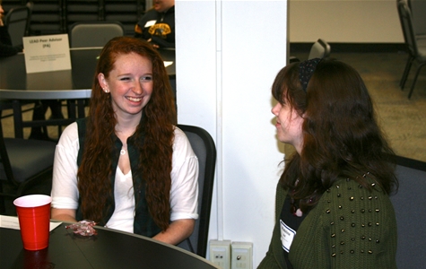 Kate Young '14 and Madeline Bell '16 discuss leadership opportunities in CHAMP, the campus event planning group.